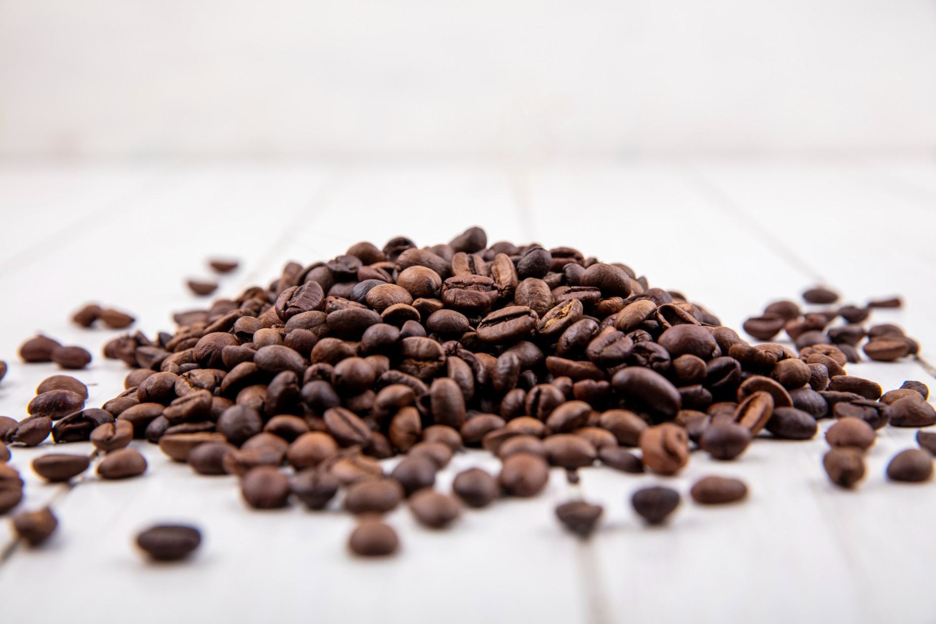 proses pemisahan biji kopi dari kulitnya